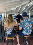 Guests seated at the open-air Academy of Rum classroom in Antigua