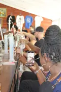 Guests preparing their blends at the rum-making counter