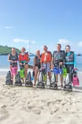 Group of guests with snorkeling equipment on the beach