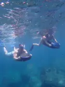 Two guests using SeaNXT ocean jets below the surface