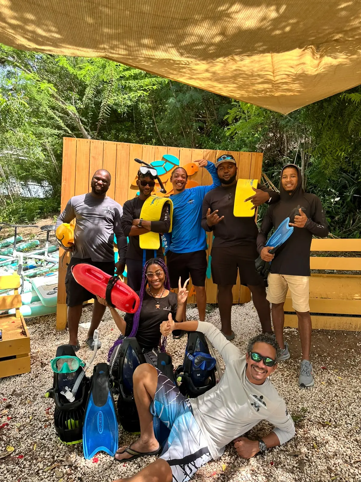 The Scooter Snorkeling team with sea scooters and snorkeling equipment at Galleon Beach
