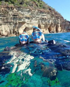 Skylork Scooter Snorkeling group of two snorkel the Pillars of Hercules near Antigua from Galleon Beach