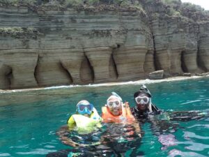 Skylork Scooter Snorkeling group of three snorkel the Pillars of Hercules near Antigua from Galleon Beach